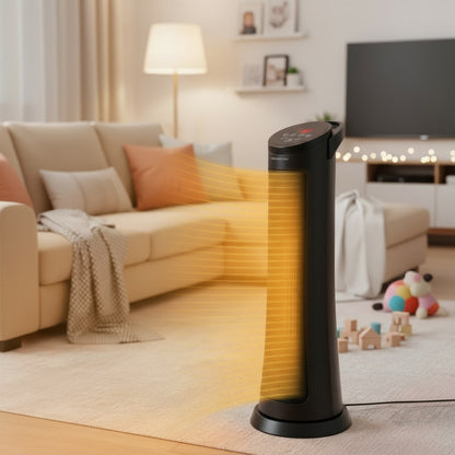 Black tower heater in a living room with a beige sofa and TV in the background